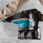 Makita GRH06PM Action Shot (drilling in wall)